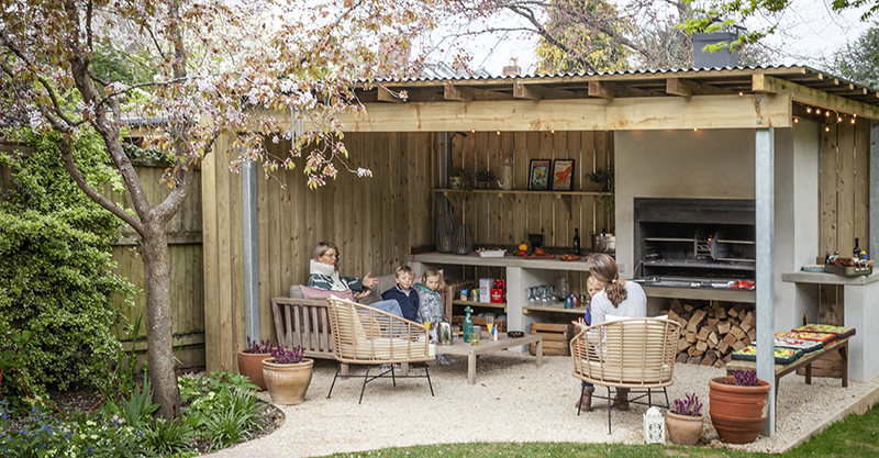 Family enjoying their outdoor kitchen