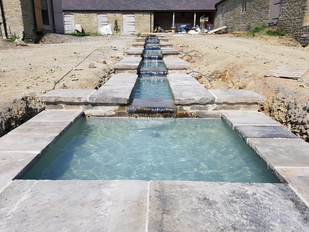 Construction of a garden pond in the Cotswolds by Gardens by Keltie & Clark